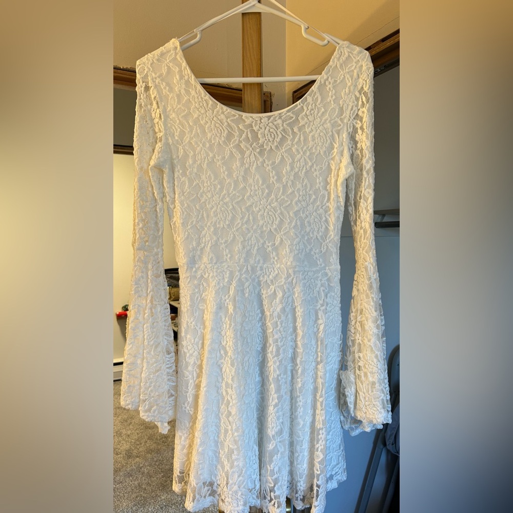 White dress with flare sleeves